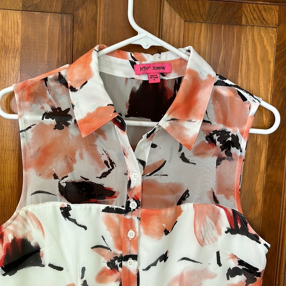 EUC dress. And 100% polyester sleeveless button down front dress